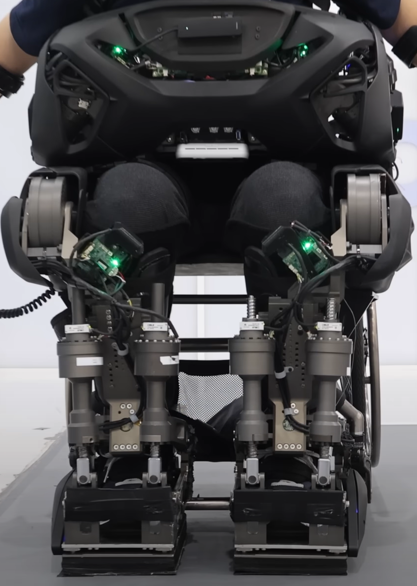 The WalkOn F1 is a next-gen exoskeleton that allows users to put it on, and walk, unaided, increasing independence for paraplegic users (Image Source : Exoskeleton lab @KAIST - Edited)