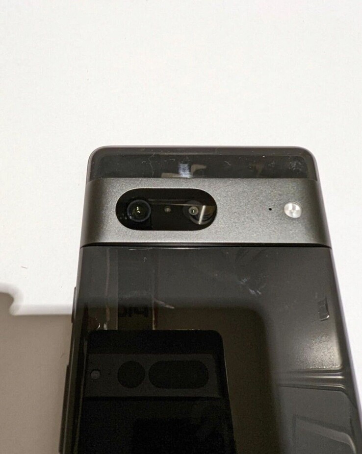 Pixel 7 rear camera layout with Pixel 7 Pro in the reflection (image via eBay)