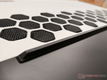 Dell says the honeycomb pattern maximizes rigidity and airflow in contrast to the long narrow slits found on most other laptops