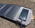 We tried charging our smartphone with a 22 W foldable solar power charger. It took days