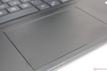 Touchpad has decent feedback with shallow travel and loud clatter