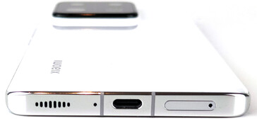 Bottom: speaker, microphone, USB port, card slot