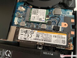 The SSD is located underneath an additional cover (secured by screws).