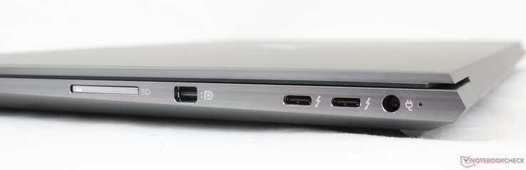 Right: SD card reader, Mini-DisplayPort 1.4, 2x USB-C w/ Thunderbolt 4 PD + DP, AC adapter