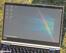 The ThinkPad outdoors (shot in direct sunlight; the display is facing the sun)