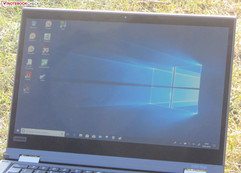 The ThinkPad outdoors (shot in direct sunlight; the sun is behind the display)