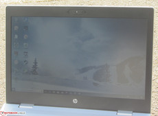The ProBook outside (shot in direct sunlight on a sunny day; the sun is behind the device).