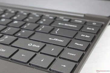 Full-size arrow keys at the expense of a shorter Shift key