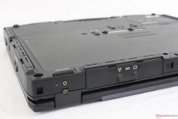 The flaps covering the ports can be easily removed with a screwdriver