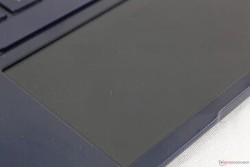 Touchscreen is matte to improve gliding but at the cost of a grainier display. Fingerprints will accumulate quickly