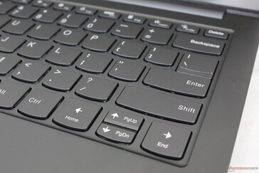 Extended Shift key at the expense of shorter Up/Down arrow keys