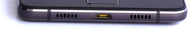 Lower edge: USB port, speaker