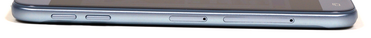 Left: Volume controls, micro-SD slot, SIM slot