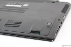 A fully inserted SD card sits flush against the chassis, but access is made difficult