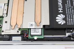 The M.2 SSD can wiggle out from beneath the heat pipe for upgrading