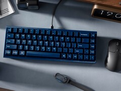 Keychron Q16 HE TMR keyboard on a desk with other peripherals
