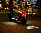 Bugatti's electric scooter features an LED light which projects the brand's logo on the ground when riding it (Image: Bugatti)