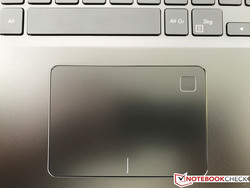 Touchpad with integrated fingerprint scanner