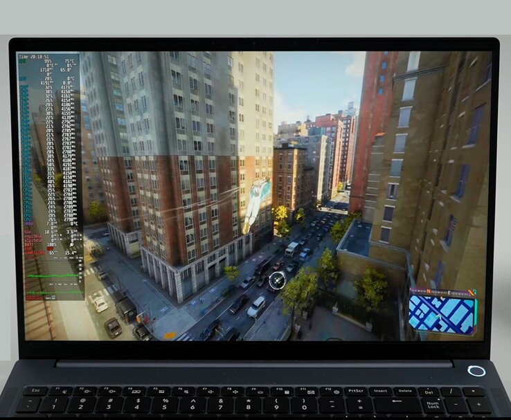 AIM MAX+ laptop running Spider-Man 2 on Bazzite with detailed system performance stats including CPU, GPU, and RAM usage displayed on the screen. (Image source: ETA PRIME)