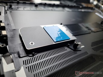 A heat spreader for the two SSDs is attached to the underside of the bottom cover
