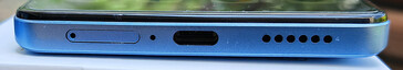 Bottom: SIM slot, microphone, USB-C port, speaker