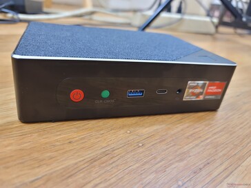 Front: Power button, CMOS reset button, USB-A 3.0, USB-C w/ DisplayPort, 3.5 mm headset