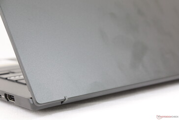 Matte outer lid is slightly roughened in contrast to the smoother surfaces of a Zenbook
