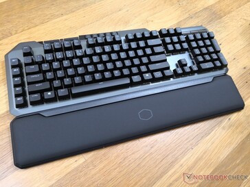 Palm rest attaches magnetically to the front edge of the keyboard