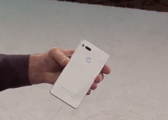 Andy Rubin holds a white version of his Essential phone. (Source: Twitter)