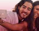 Wouldn't you be all smiles too if you only had to pay $1 for monthly mobile service? (Source: Virgin Mobile)