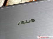 Asus logo on polished aluminum: