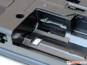 The SIM card for models featuring a WWAN module is inserted in the battery compartment.