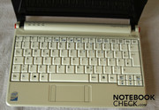 The keyboard is also white, some keys are very small, but the layout is standard.