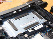 The 2.5-inch HDD is not secured by screws, but sits in a buffered cage.