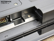 We find something like an embrasure for a possible SIM card slot underneath the battery.