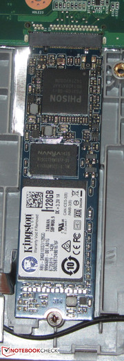 An SSD in M.2 format is the system drive. You have to remove the battery in order to reach it.