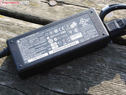 with a 75 watt power adapter. with a 75 watt power adapter.