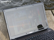 The glossy screen reflects everything in sight in direct sunlight. The glossy screen reflects everything in sight in direct sunlight.