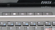 A few hot keys are found above the keyboard. Their functions from left to right: DVD eject, screen power, power settings, Mobility Center, Wi-Fi, power A few hot keys are found above the keyboard. Their functions from left to right: DVD eject, screen power, power settings, Mobility Center, Wi-Fi, power