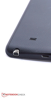 The stylus is inserted in the casing's lower edge.