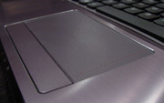 And speaking of which, the touchpad continues the excellent tradition of the Y570's fit and finish, with a stippled surface and a color-matched scrollbar.