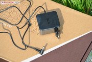 The power adapter offers 65 W.