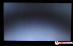 Black Picture with "bad smiley effect" (on top: bright corners, on the bottom a curved, bright light cone) Black Picture with "bad smiley effect" (on top: bright corners, on the bottom a curved, bright light cone)