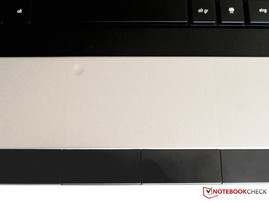 There is no color differentiation between the wrist rest and the touch pad There is no color differentiation between the wrist rest and the touch pad