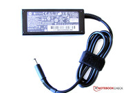 65 watt power adapter. 65 watt power adapter.