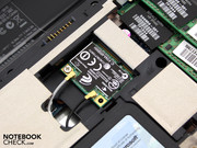 The WLAN module in the mini PCI Express slot. The WLAN module in the mini PCI Express slot.