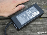 |The heavy 120 W power adapter seems too big when compared to the form factor of the 15.6 inch device. |The heavy 120 W power adapter seems too big when compared to the form factor of the 15.6 inch device.