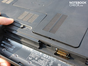 The battery release mechanism just needs to be pushed outwards to the left (no screws). The battery release mechanism just needs to be pushed outwards to the left (no screws).