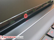 The HP logo is styled red to cohere with the red and black color scheme
