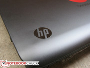 The glossy and humble HP logo is contrasting to the matte notebook